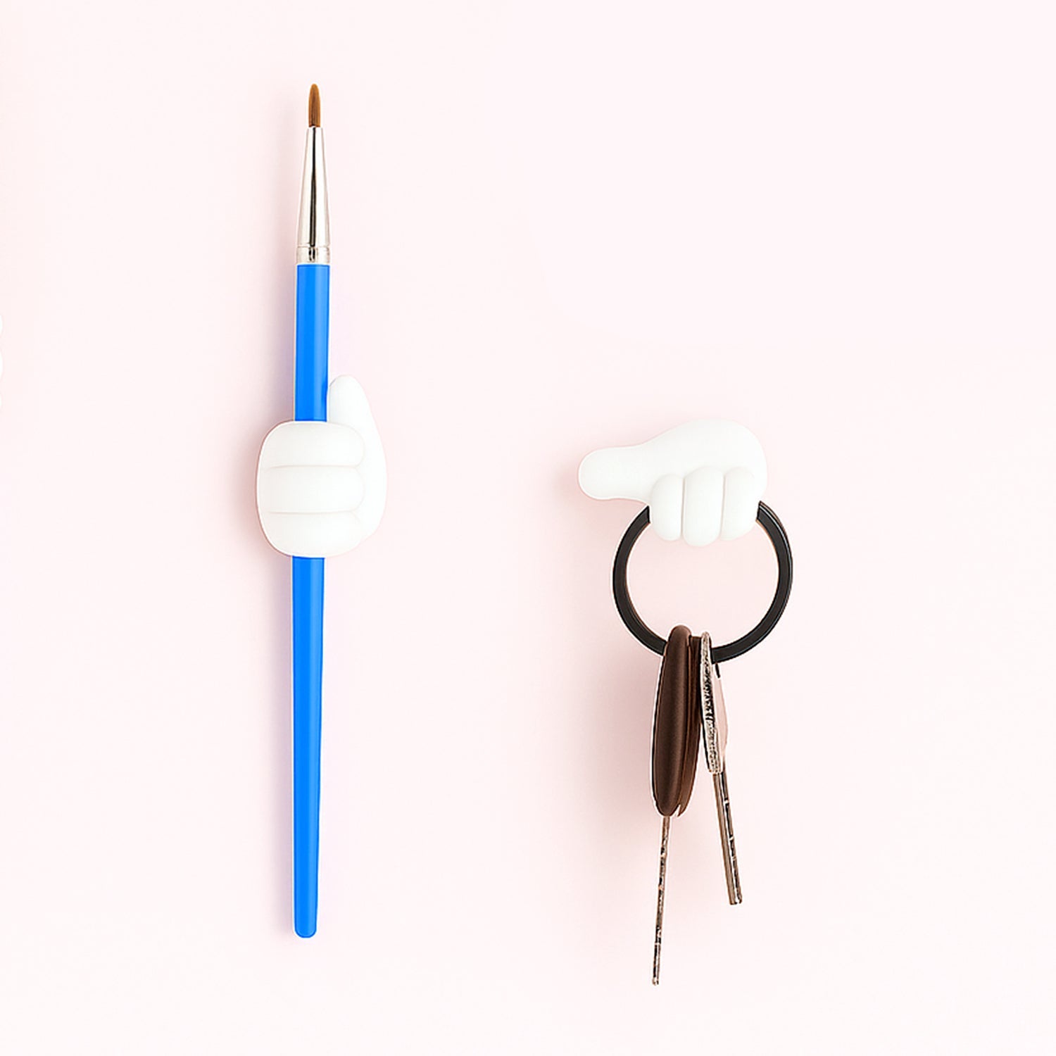 White multifunctional hand-shaped wall clip organizing various small items