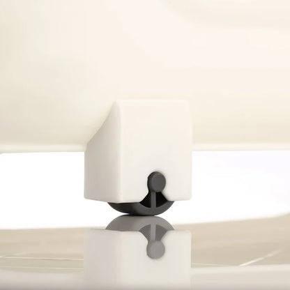 Side angle view demonstrating ergonomic handle and wheel mechanism