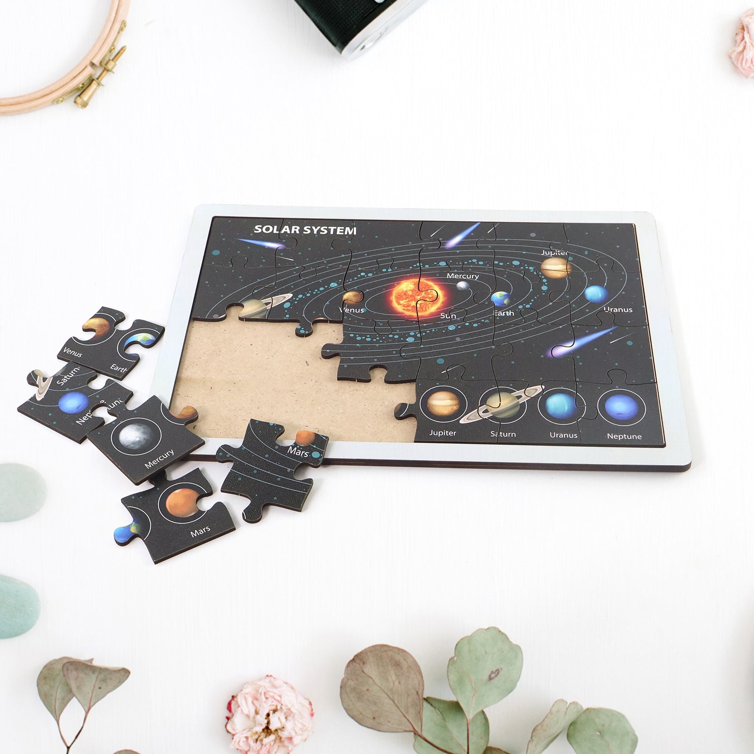 Fun and colorful wooden solar system puzzle for kids learning about space