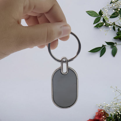 Stylish urban accent oval metal key ring in black and silver