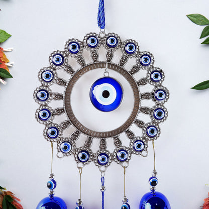 Full view of Om evil eye wind chime with soothing bells