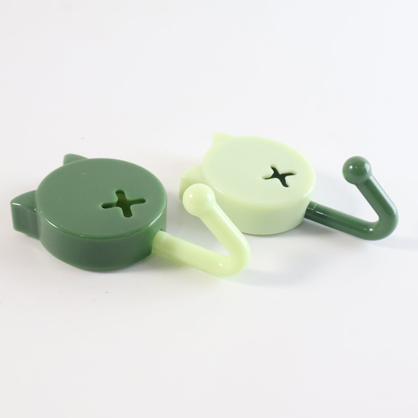 Sticky adhesive base of self adhesive round wall hooks showing strong adhesive pad