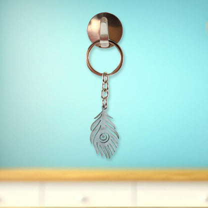 Elegant laser-cut peacock feather keychain accessory