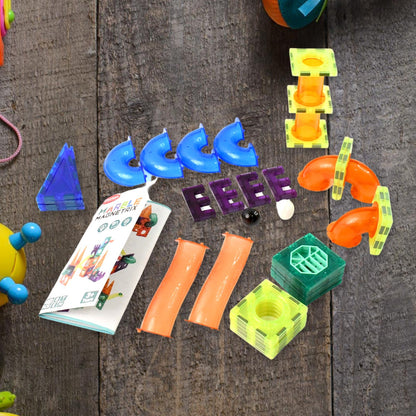 Magnetic marble run components including magnetic tiles and marbles