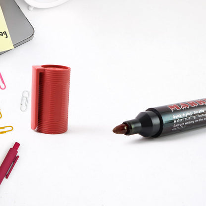Red permanent marker used for labeling documents and packages