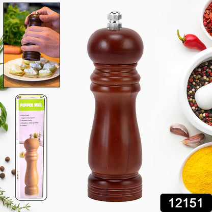 Close-up view of a classic wooden pepper mill, showcasing its natural grain and smooth finish.