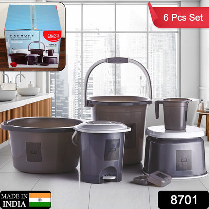 Colorful plastic mug and basin included in bathroom accessories set