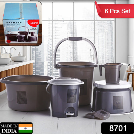 Colorful plastic mug and basin included in bathroom accessories set