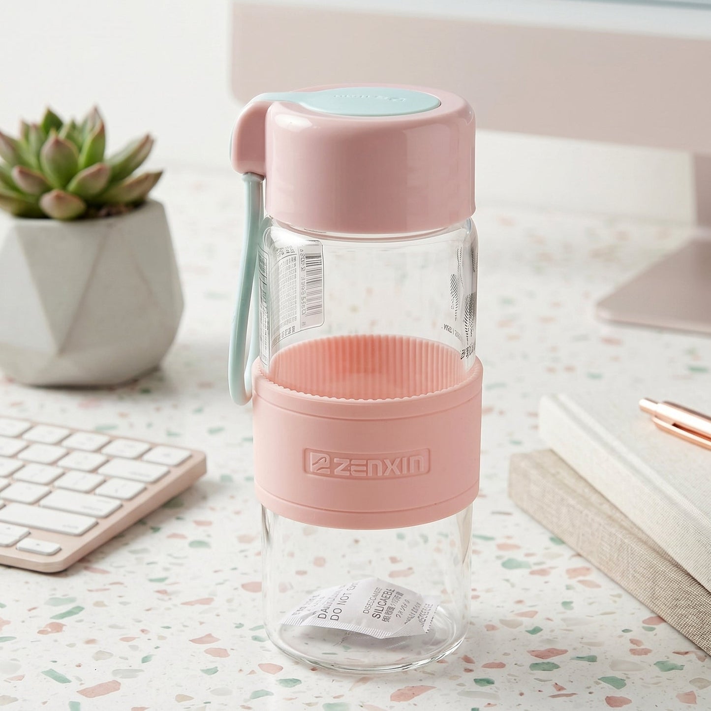 Leak resistant glass bottle with carry strap for on the go hydration