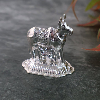 Auspicious Kamdhenu cow and Tulsi plant silver-plated pooja accessories set