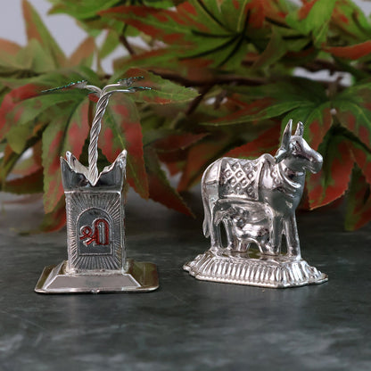 Elegant silver-plated Kamdhenu cow and Tulsi plant pair for religious blessings