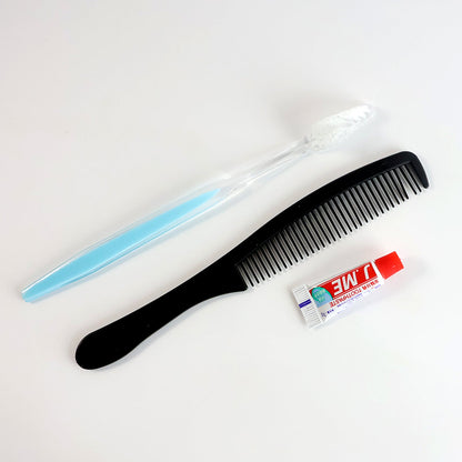 Mini travel hygiene kit featuring toothbrush and comb for quick grooming